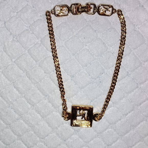 Nina Ricci Rhinestone Logo Gold Tone Bracelet - Picture 2 of 2